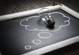 thought bubble encompassing light bulb