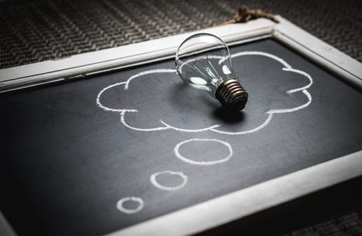 thought bubble encompassing light bulb