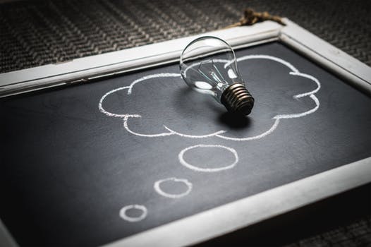 thought bubble encompassing light bulb
