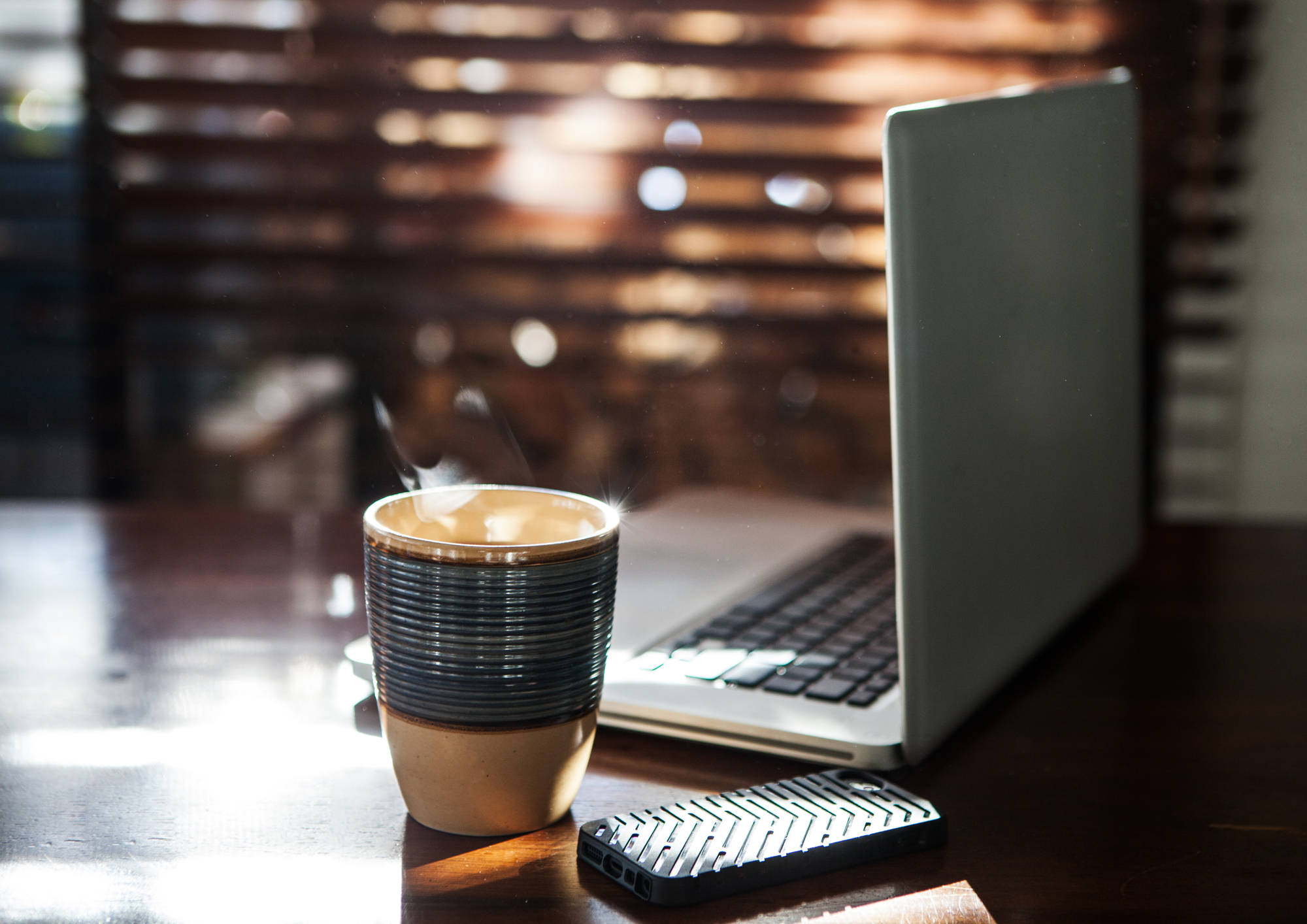 tools to work remotely effectively - laptop and coffee